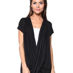 NWT Free to live X cross short sleeve top size M.